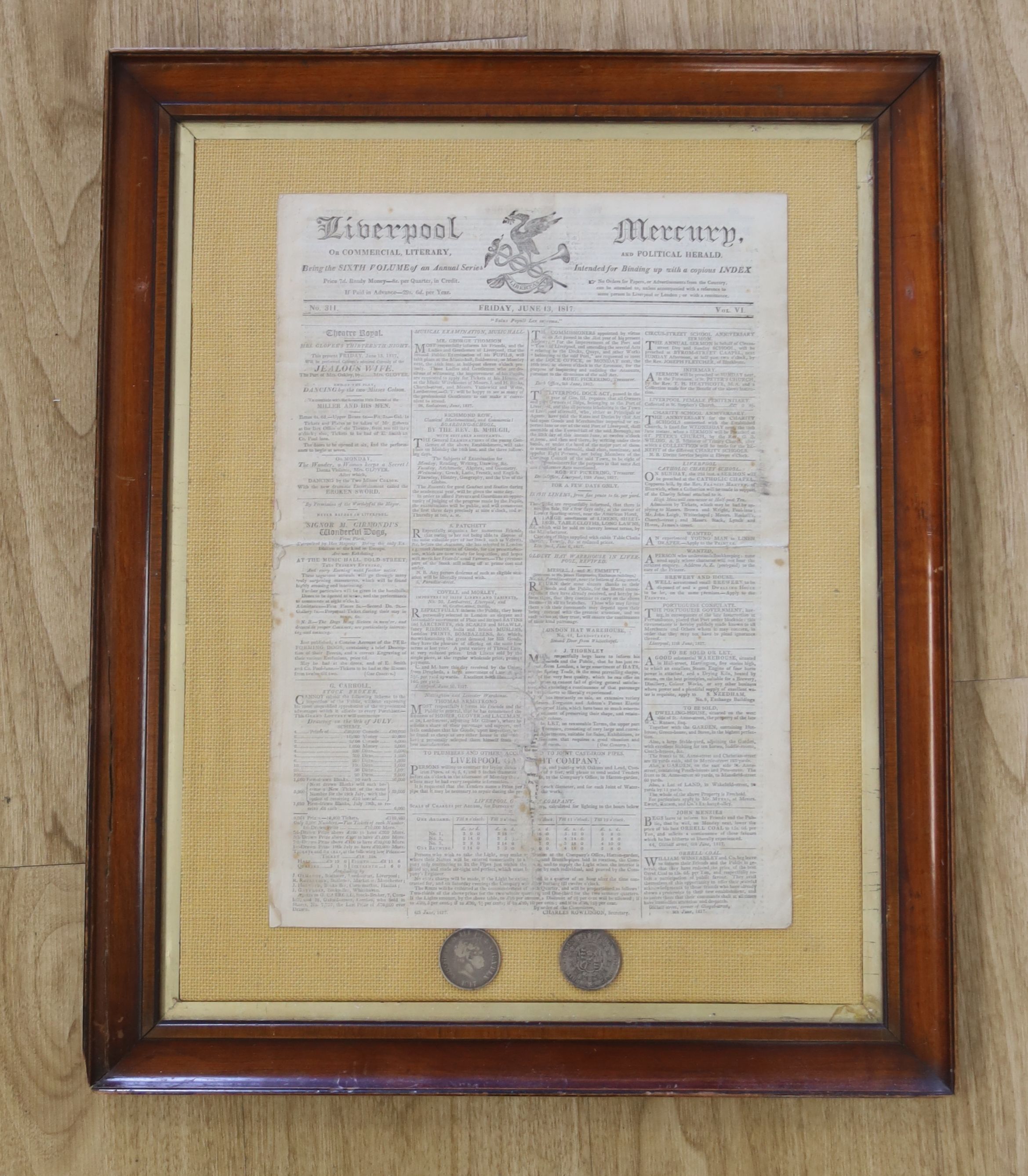 A framed page from Liverpool and Mercury 1817 and two 1817 coins